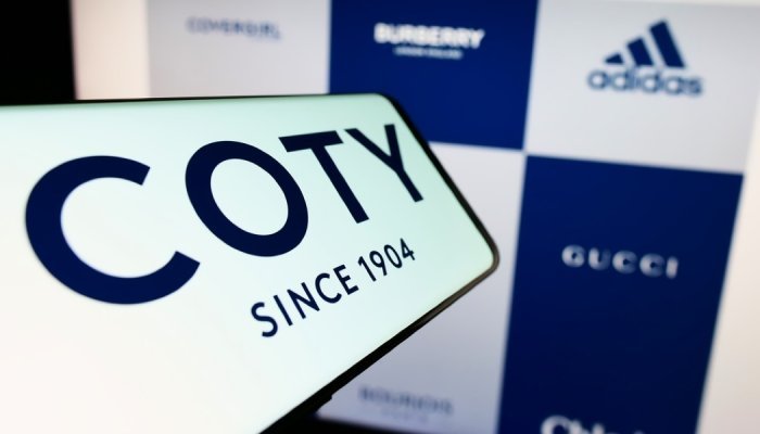 Coty's annual sales surge but profits crumble